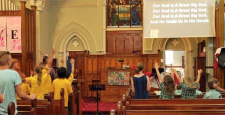 Morning devotions inside the church building